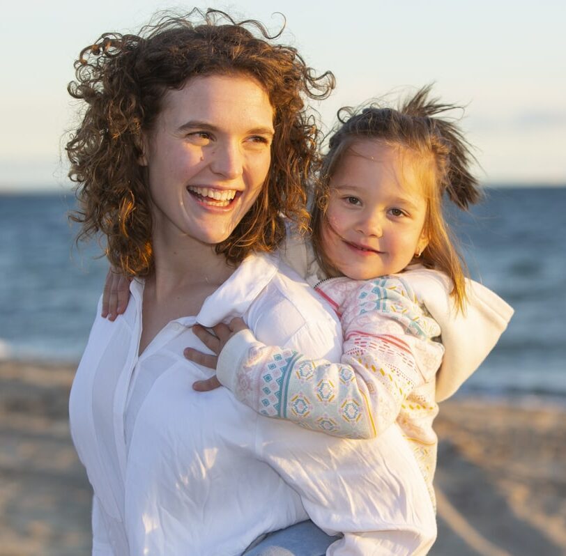 Aupair carrying baby